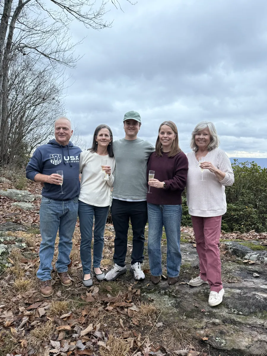 Family champagne toast at the overlook after the proposal